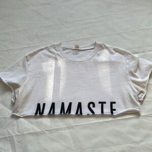 1488- Alo White Crop Top with 'Namaste' Print in black- xsmall